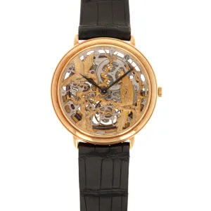 Audemars Piguet Yellow Gold Ultra Thin Skeletonized Watch with Ornate Bird Dial