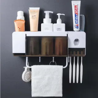 Toothbrush holder for toilet storage